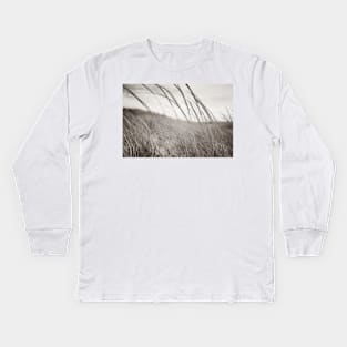 Abstract sepia toned effect Marram grass blowing in wind.  imagine this on a  card or gracing your room as wall art fine art canvas or framed print on your wall Kids Long Sleeve T-Shirt